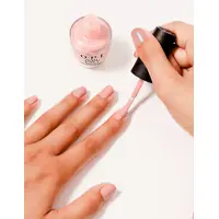 Applying OPI Nail Envy Bubble Bath nail strengthener