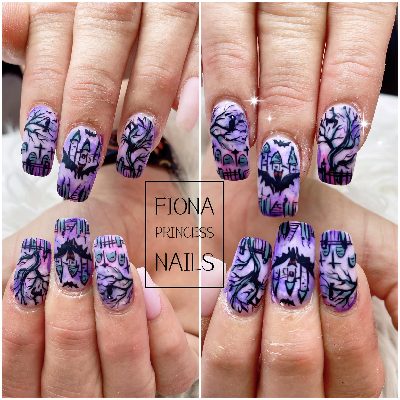 Long square nails with purple watercolor backgrounds and black haunted houses, tombstones, bats, bare trees, and a crow.