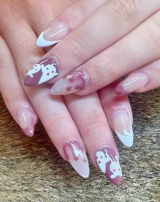 Long almond nails with a sheer pink base, white French tips, burgundy dripping-blood accents, and white ghost nail art.