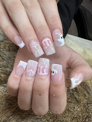Long square pink nails with white ghosts, spiderwebs, a webbed heart, dripping pink details, and soft French-tip accents.