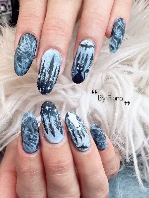 Long almond nails with gray mist, black forest silhouettes, bats, stars, and a white ghost across both hands.